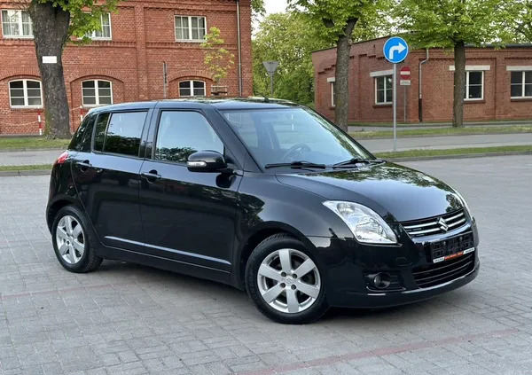 suzuki Suzuki Swift cena 16900 przebieg: 121000, rok produkcji 2009 z Gniezno